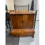 A reproduction walnut effect Dutch style TV cabinet