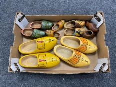 A box of six pairs of wooden clogs including mid century vintage clogs