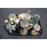 A tray of beer steins, antique soda glass, ornamental flintlock pistol, wooden wall plaques,