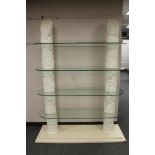 A Barker and Stonehouse Corinthian style four tier glass shelf stand, width 140 cm,
