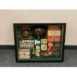 A framed football montage,