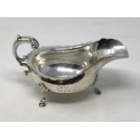 A silver sauce boat on three hoof feet, London marks CONDITION REPORT: 246.6g.