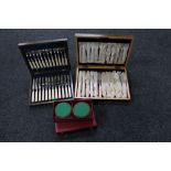 Two twentieth century cutlery canteens of fish cutlery, cased steak knives and forks,