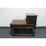 An early 20th century carved telephone table