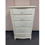 A Laura Ashley cream five drawer chest,