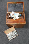 An early 20th century multi drawer mahogany dentist's chest with dental accessories