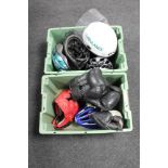 Two plastic crates of ambulance helmet with visor, bike helmet,