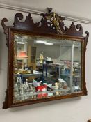 An antique mahogany framed Chippendale style mirror