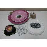 Six pieces of antique and later china - lustre tourist plates, Isle of Man teapot stand,