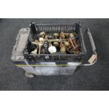 A Stanley mobile tool chest together with a plastic box of brass taps, castors,