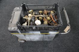 A Stanley mobile tool chest together with a plastic box of brass taps, castors,