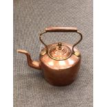 A Victorian copper kettle