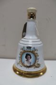 A Bell's commemorative porcelain decanter to commemorate the 60th birthday of Her Majesty Queen