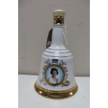 A Bell's commemorative porcelain decanter to commemorate the 60th birthday of Her Majesty Queen