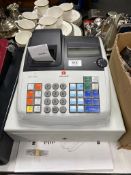 An Olivetti ECR7100 cash register with keys