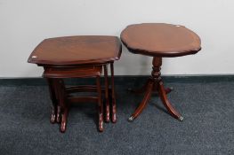 A nest of three inlaid tables and a matching wine table