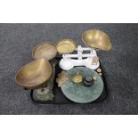 A tray of two sets of vintage brass pan scales with weight together with a marble cheese board