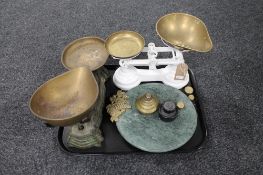A tray of two sets of vintage brass pan scales with weight together with a marble cheese board