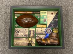 A framed rugby football montage,