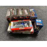 A tray of ten boxed exclusive first edition die cast busses together with four other die cast