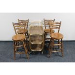 Four elm kitchen bar chairs and a gilt three tier trolley