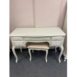 A Laura Ashley cream dressing table,