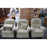 Three armchairs in a floral fabric and a matching footstool