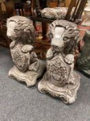 A pair of garden figures, heraldic lions,