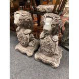 A pair of garden figures, heraldic lions,