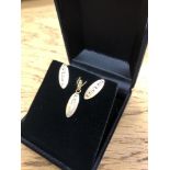 An 18ct three-tone gold pendant and matching earrings with post fittings CONDITION