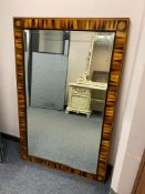 An inlaid rectangular bevelled mirror, with parquetry inlaid frame,