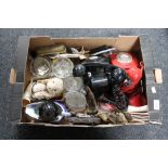 A box of glass ware, vintage telephones,