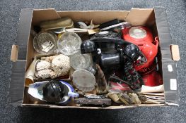 A box of glass ware, vintage telephones,