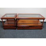 A mahogany glass top coffee table and matching lamp table