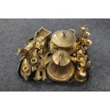 A tray of brass wares, hand bell, mining figure, horse and cart, candlesticks,