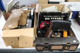Two boxes of projectors, assorted cameras, cine camera,