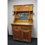 An Edwardian pine mirror backed sideboard