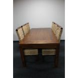 A contemporary rectangular dining table and six high back wicker dining chairs