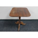 A Victorian pedestal occasional table