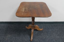 A Victorian pedestal occasional table