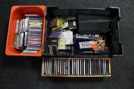 Two plastic crates of CD's and cassette tapes,