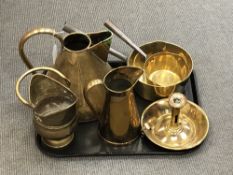 A collection antique brass pans, brass jug,