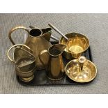 A collection antique brass pans, brass jug,