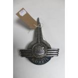 A vintage Morris truck badge