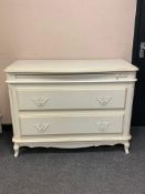A Laura Ashley two drawer chest with slide,