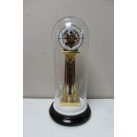 A French Escart mystery pillar clock with platform escapement, enamelled dial,