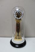 A French Escart mystery pillar clock with platform escapement, enamelled dial,