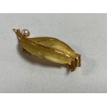 An 18ct gold leaf brooch with seed pearls CONDITION REPORT: 4.2g.