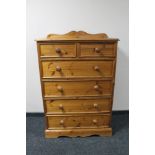 A pine six drawer chest