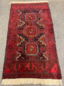 An Afghan rug 100 cm x 180 cm